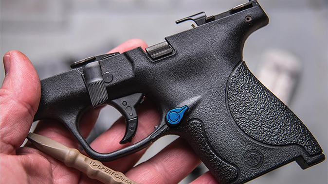 Tyrant Designs M&P Shield Extended Magazine Release closeup