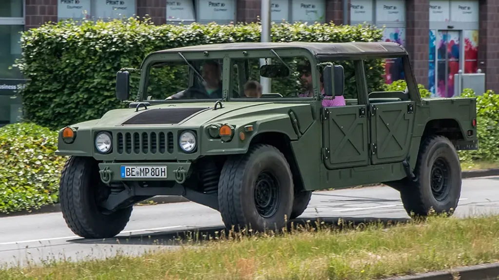 Yor new Military Humvee will still need title and insurance,