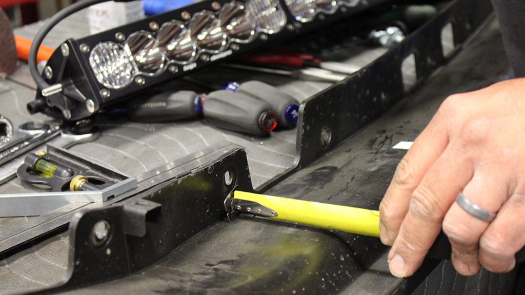 Measurements are taking in preparation of installing the LED light bar.