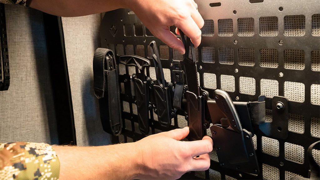 The cross hatch panels have mounting holes to accept steel hooks for hanging gear or running nylon webbing.