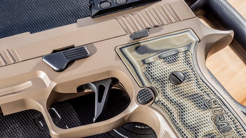 The Sig Sauer X-Series straight trigger of the AXG Scorpion offers a 90-degree break for better geometry.