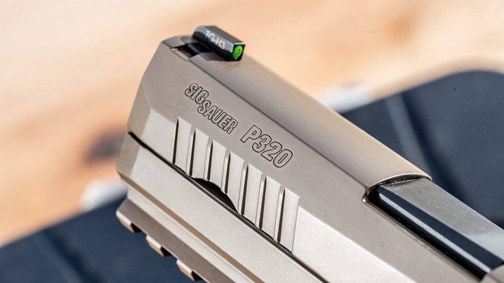 The AXG Scorpion features forward serrations and a Tritium front sight.