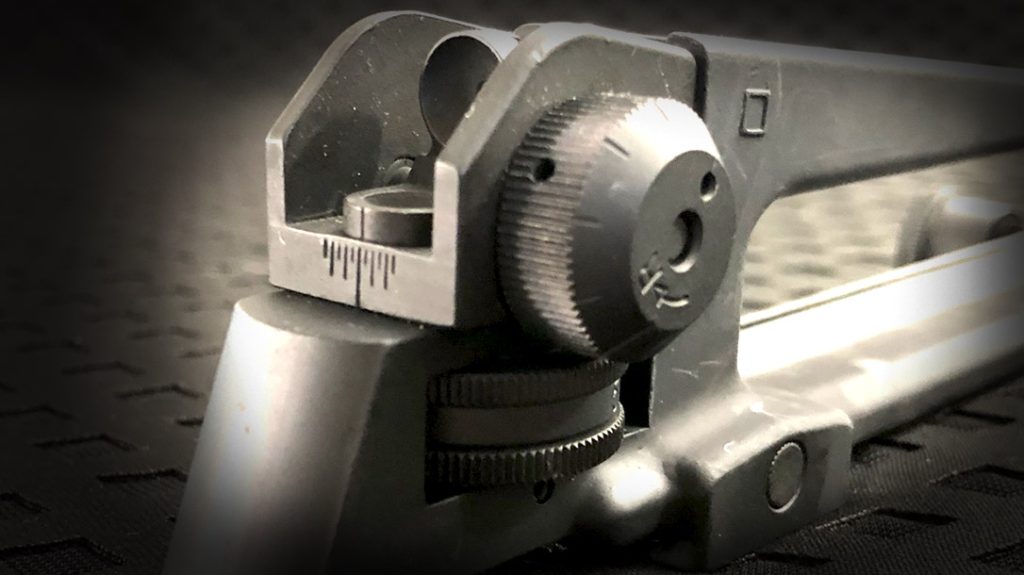 Rear sight windage and elevation dials.