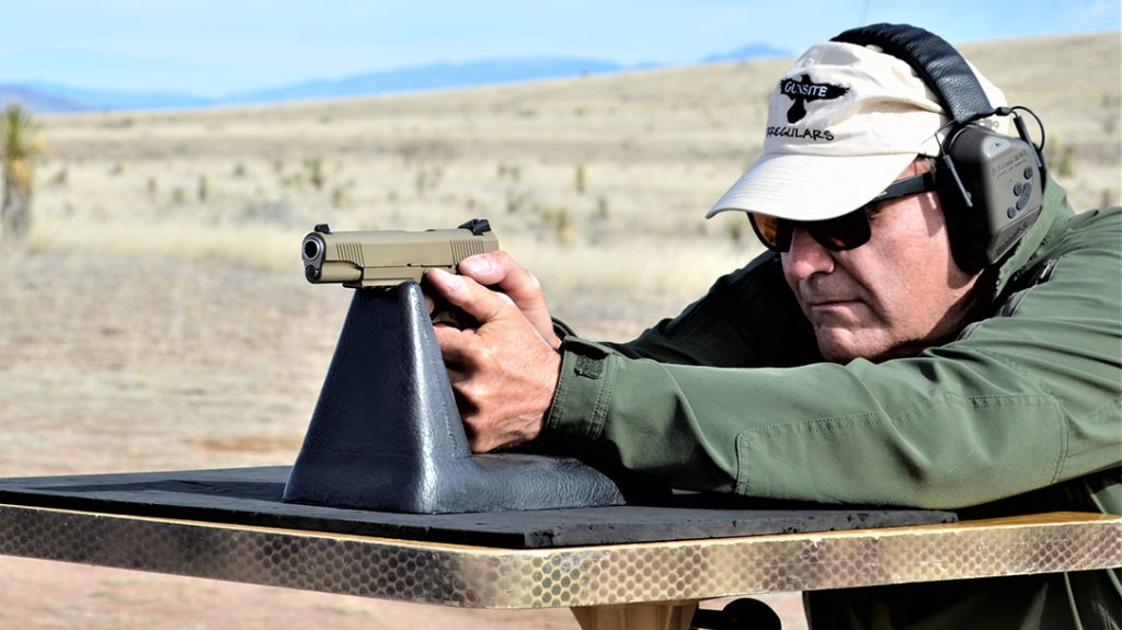 Shooting the Tisas 1911 Raider from the bench. 