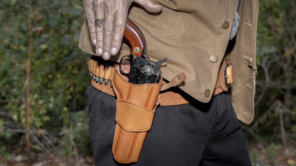 To pack the Model P during a western action shooting match, the author used this Model 1880 cartridge belt and holster rig from Galco.