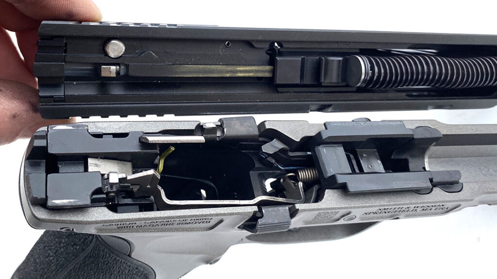 The frame's front locking block looks ordinary in this photo, but it’s actually the Custom Accuracy Rail that ties the barrel, slide, and frame precisely together.