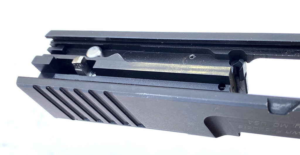 Ed Brown replaced the factory striker with its own custom stainless steel skeletonized striker in the Fueled M&P 2.0.