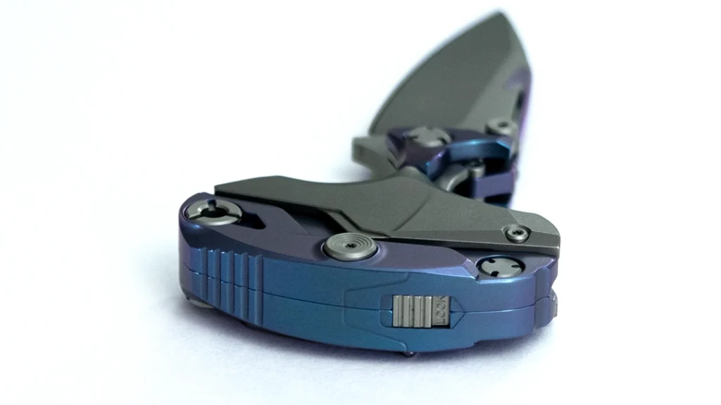 A lock on the back of the grip holds the knife in whichever configuration it is currently in.