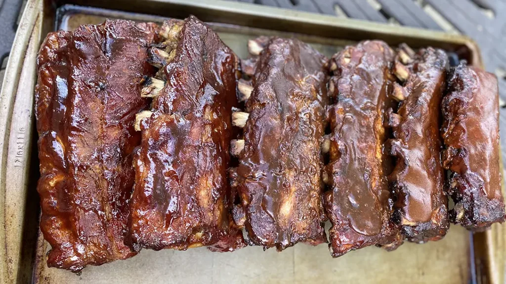 The finished product with this BBQ smoking method is fall off the bone ribs.
