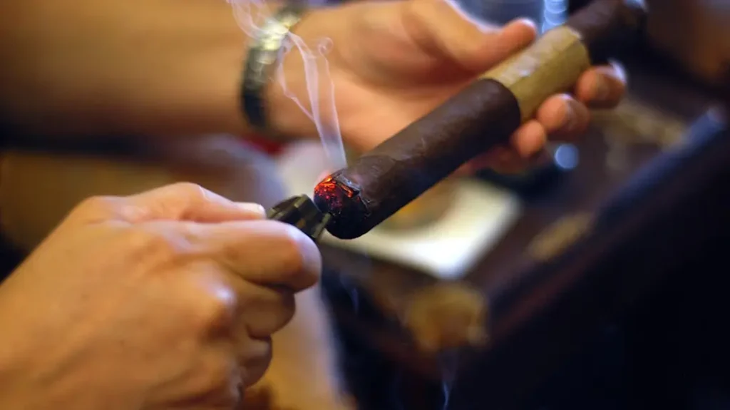 Light the cigar away from your mouth to begin with.