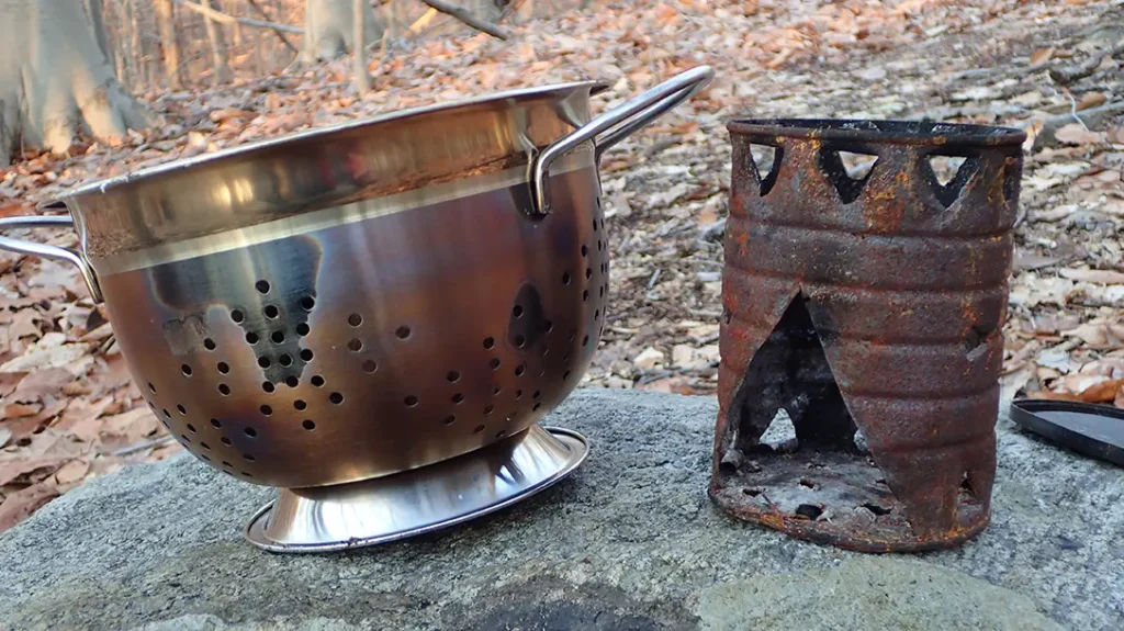 A colander makes a great addition to your hobo stove setup.