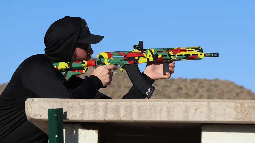 Multi-color AK rifle.