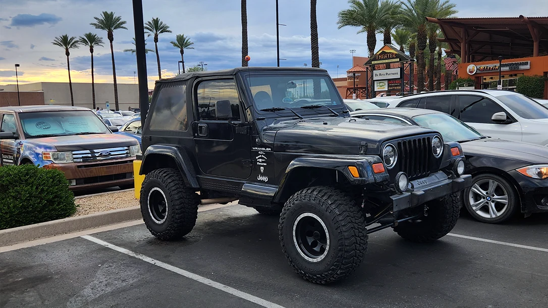 A vintage Jeep Wrangler TJ at a local cars and coffee event.