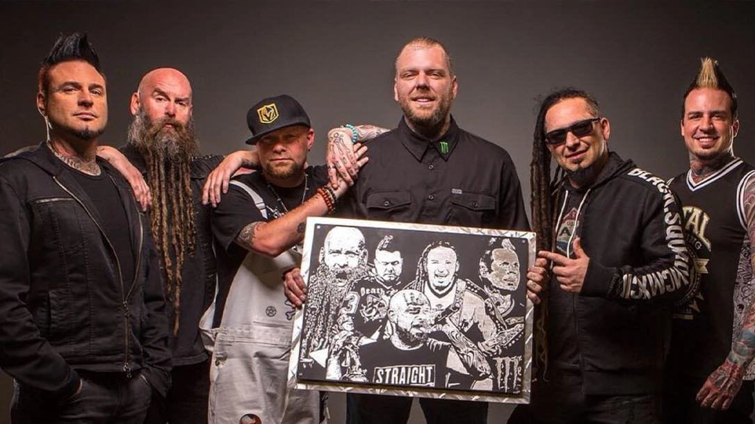 Five Finger Death Punch with some of his gifted art.