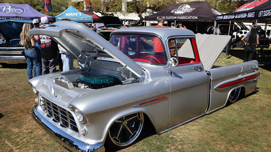 A classic Chevy truck laid out on the grass of the Reunion Truck Show.