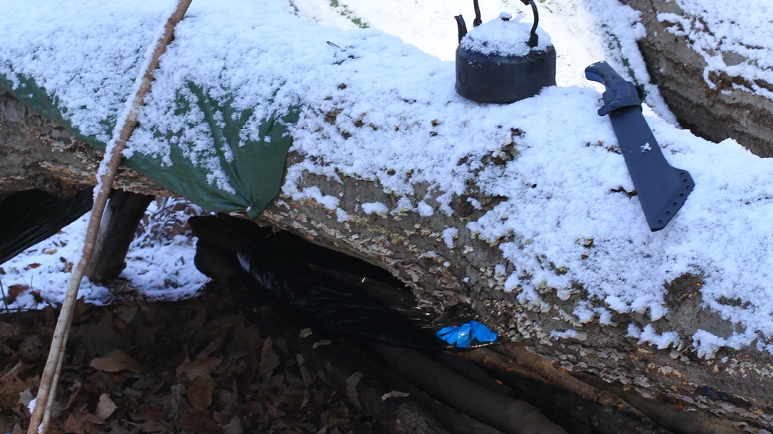 Snow added to the stealthy shelter, further hiding it from the average hiker.
