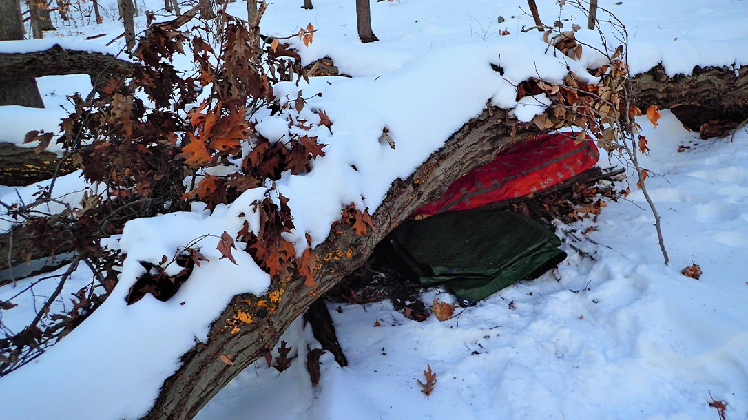 The author used a brightly covered bivy bag for added warmth, which can still be seen in an emergency.