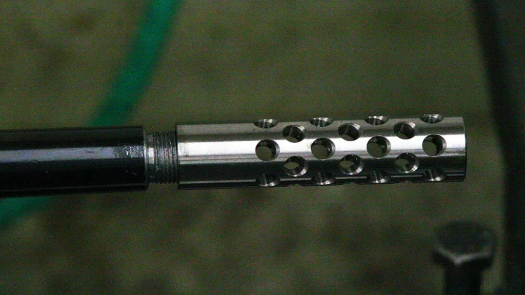 The final attachment process for installing a muzzle brake.