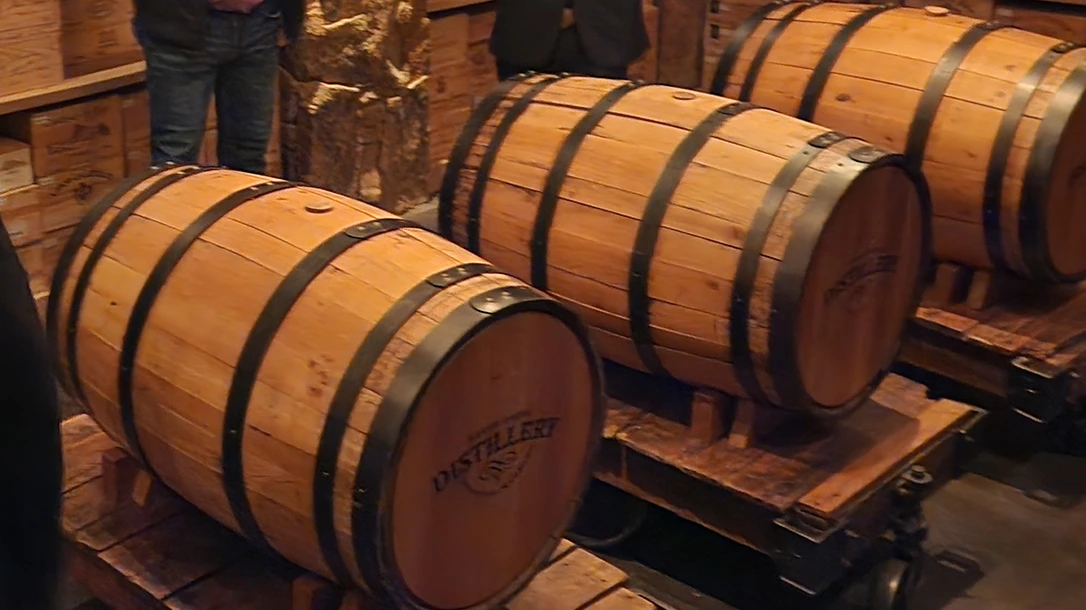 A display of homemade whiskey barrels, symbolizing how this beloved drink was not just a beverage but a vital part of the rural economy.
