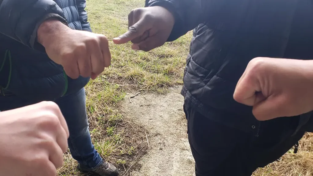 How to Throw a Punch: Wrap your thumb OVER your fingers. Lock your wrist straight and hit with your FIRST TWO knuckles.