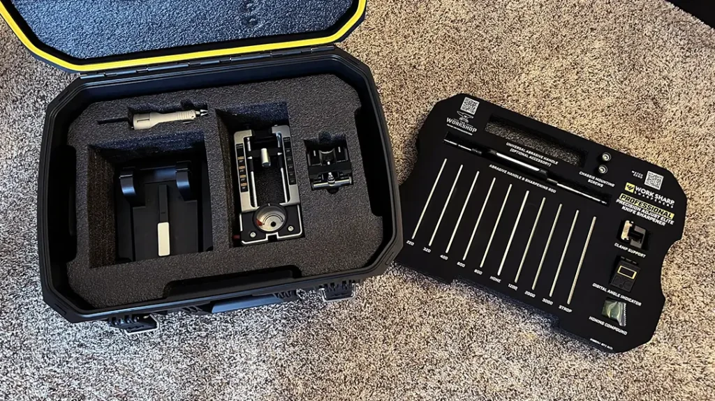 The case features a removable foam lining base with separate cutouts for each piece of the Work Sharp Professional Precision Adjust Elite sharpening system.