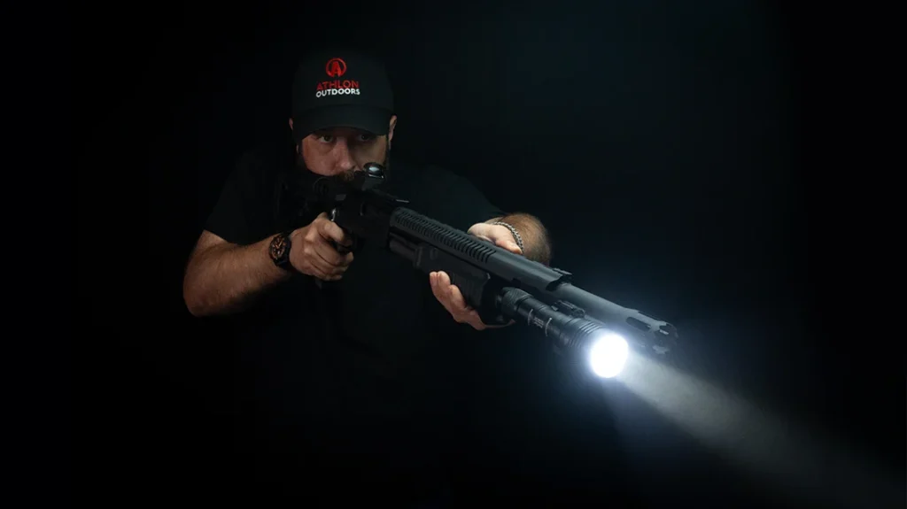 The author outfitted his Mossberg 590R with a Streamlight ProTac mounted forward on a solid Pic rail.