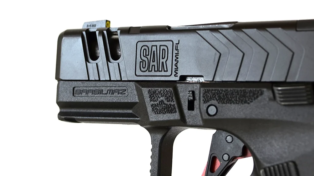 There are cutouts in the slide, ostensibly to lighten it and improve its cycling.