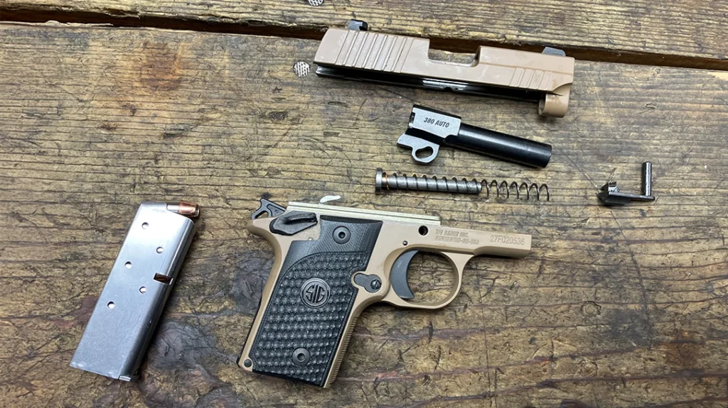 The pistol field stripped.