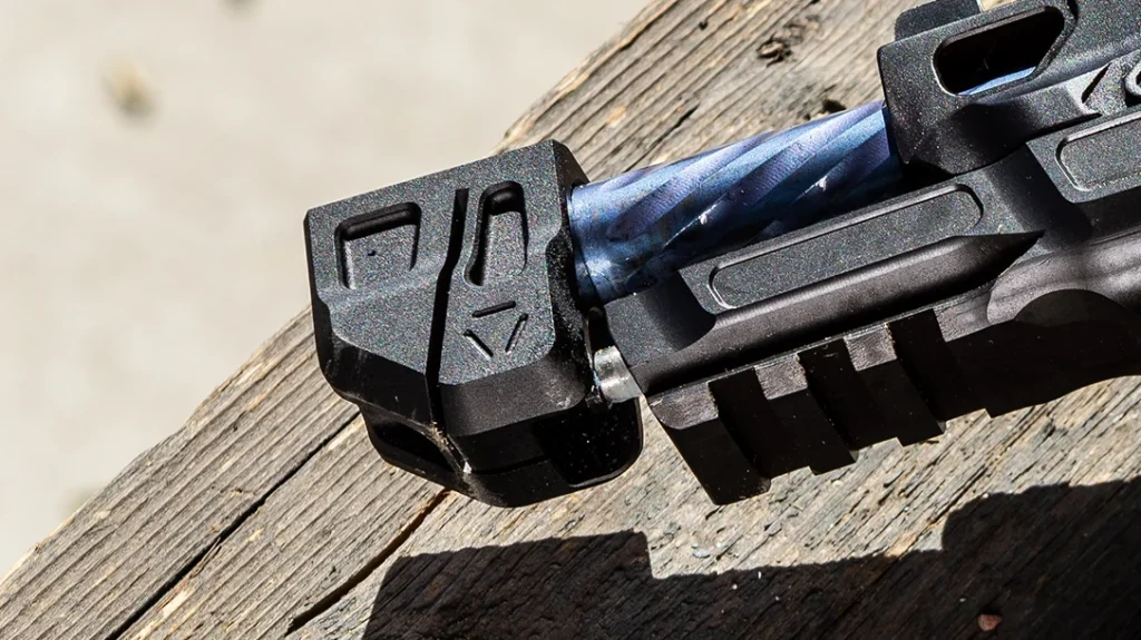 At the end of the barrel is the Strike Industries Compensator.