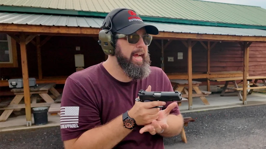 Tap the magazine hard with the palm of your support hand.